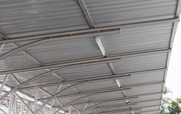 installing Tame Water metal roofing